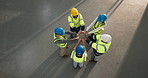 Group, circle and architect with fist bump in warehouse above for construction solidarity. Top view, people or team of contractors with hands together for collaboration, motivation or unity in depot