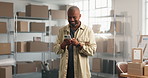 Laugh, man or phone in small business for logistics, funny delivery request or shipping joke. Supply chain, mature black person or happy with mobile for comic courier chat, distribution meme or order