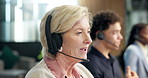 Headset, woman and technical support consultant in office with crm, voip system or online advisory. Mic, talking and mature call center agent in workplace with customer service, help desk or contact.