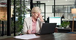 Mature, woman and stress with laptop in office for financial crisis, bad news or business debt. Female person, headache and migraine with glasses or eye strain on computer for company bankruptcy