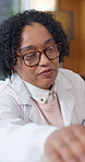 Doctor, patient and support for healthcare diagnosis, empathy and comfort with advice in clinic office. Mature physician, person and help with sympathy, treatment plan and medical care for health