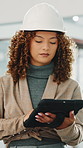 Engineer, development and serious woman with tablet in building for quality assurance checklist. Female person, construction and tech for inspection report, track progress or project schedule at site
