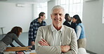 Architect, face or man in office with arms crossed, project manager or pride as building planner. Meeting, happy or mature engineer with confidence, about us or ambition in infrastructure development