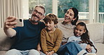 Happy, family and silly selfie in home for weekend memory, bonding or funny picture together. Mom, dad and playful children with goofy smile for photography, comedy or holiday humor on sofa in house