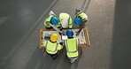 Architect, team and meeting with tablet in building, discussion or planning for property development. Civil engineer, space and people with tech, above and collaboration with blueprint for design