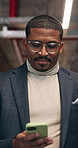 Business, man and walk in office with phone, research and reading email for auction inquiry. Male person, realtor or review in workplace with mobile, update price and schedule viewing for real estate