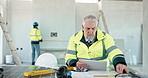 Mature, man and architect with tablet for construction planning or building design on site. Male person, contractor or civil engineer with technology or layout for safety, security or maintenance