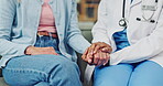Healthcare, doctor and holding hands with senior patient, checkup and empathy for medical diagnosis. Consultation, appointment and comfort for old person, wellness and health service in hospital