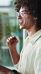 Excited, online and man with computer in business, copywriting and reading positive feedback on web. Copywriter, typing and happy person with technology, fist pump and celebration for article success