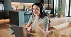 Woman, wave and video call in house with laptop, headphones or online teacher talk with remote work. Happy, person and educator speaking in home with computer, hello and virtual meeting for lesson.