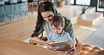 Book, reading and mom with baby in house for relax, bonding or family connection on weekend. Happy, love and mother with boy toddler on sofa for story time together in living room at apartment.
