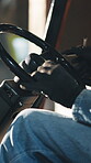 Logistics, hands and driver in forklift, closeup and cargo distribution with vehicle or supply chain. Shipping, distributor and person with gloves in warehouse, freight and delivery with transport