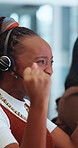 Excited, woman and fist pump at call center with headset, good news and bonus for sales success. Person, coworking or applause in office with mic, positive feedback and celebration of crm achievement