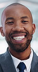 Attorney, black man and face with laugh in office for legal council, advocate and representation. Portrait, legislation and confident lawyer at law firm agency for court case, hearing or trial
