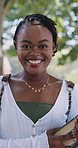 University, face or student on campus with books, knowledge or positive attitude in study opportunity. Smile, bokeh or black woman with confidence, college literature or pride in academic growth.