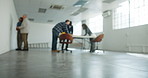 Office, planning and blur of people for architecture, interior design and remodeling in workspace. Team, contractor and workers in meeting for ideas, collaboration and feedback for renovation project