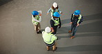 Above, people and dance on construction site for building, repairs or renovation with space. Celebration, teamwork and civil engineers for maintenance, remodeling or property development success