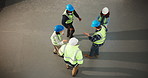 Above, people and excited on construction site for dance, repairs or renovation with space. Celebration, teamwork and civil engineers for maintenance, remodeling or property development success