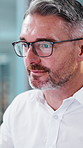 Financial planning, online and businessman with glasses in office, reading or research with computer. Corporate, wealth management and mature person with tech, risk assessment and project on website