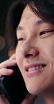 Japanese man, smile and phone call in city for conversation, discussion and booking with travel. Asian person, night and happy outdoor for bokeh, communication and evening commute with tourism