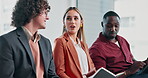 Business, people and talking in waiting room for interview, application and resume for hiring. Team, candidates or discussion in office with document, review cv and recruitment process for onboarding