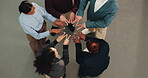 Above, business team and star for solidarity with huddle, trust and support with motivation. Shape, hands together and professional people in office with community, collaboration and corporate goals 