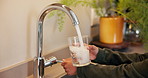 Health, hands and glass of water at tap in home for wellness, nutrition and child development. Thirsty kid, hydration and pour clean liquid with faucet, minerals and growth benefits at kitchen