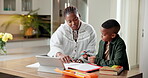 Homework, elearning and tablet with mother and black child in home for writing, education and support. Project help, notebook and online course with woman and kid in family house for math assignment