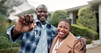 Keys, hand and black couple with new home, smile and pride for property investment and milestone. Start, real estate and happy portrait for bond approval, dream house and hug outdoor in backyard