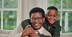 Mom, son and black family with hug on sofa for love, care or bonding together in home. Happy, mother and smile with child, kid or embrace on couch for comfort, weekend break or holiday in house