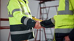 Architect, meeting or handshake with deal for construction planning or building partnership on site. People, civil engineer or contractor shaking hands with agreement for architecture development