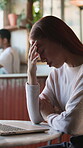 Freelancer, stress and woman with laptop in cafe, online and unhappy with design mistake on website. Remote work, graphic designer and person with technology, burnout and bad news for project in shop
