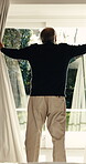 Thinking, opening and old man at window with curtain, daydreaming and chill mindset in morning. Retirement, back and senior person with reflection, getting ready and peaceful perspective in house.