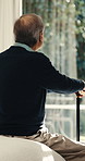 Thinking, relax and senior man with cane in bedroom for nostalgia, memory or remember retirement. Reflection, perspective and elderly person with a disability in house for decision on pension