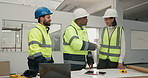 Architect, team and handshake with happy people in meeting, agreement or discussion with floor plan. Civil engineer, success and shaking hands with colleagues, smile and collaboration with blueprint