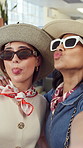 Funny face, friends and selfie in shopping mall for fashion, social media status and smile together. Women, excited and picture at boutique with stylish sunglasses, tongue out or goofy hat for memory