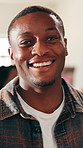 Face, happy and man in office for creative career, ambition and opportunity at advertising agency. Portrait, smile and black person with pride for project management, marketing or about us at company