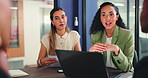 Laptop, talking and business women in meeting for advertising, creative project and brand campaign. Team, office and workers on computer for online report, website and feedback for digital marketing