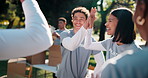 Charity, volunteer and high five with friends, outdoor or team with clipboard for donation schedule. Nonprofit, community service and happy people with checklist, laughing and celebration for success