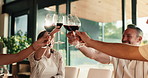 People, celebration and cheers with wine glass in home for get together, dining or social gathering. Hands, happy group or friends with toast or alcohol for drinking event or holiday dinner in house