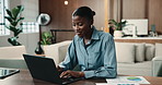 Laptop, office and woman with finance documents, graph or statistics for investment analysis. Happy, typing and black person with computer, paperwork or chart for financial review, research or report