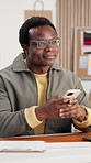 Logistics, thinking and black man in agency with phone, vendor contact and order insight on webstore. Happy, reflection and seller with tech, supplier negotiation or delivery planning for online shop