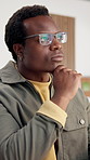 Creative, thinking and black man in office with idea, typing and graphic design inspiration. Reflection, person planning and designer at work startup for brand logo, problem solving and vision