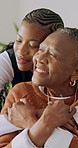 Support, caregiver and old woman in lounge with hug, connection and security in assisted living. Black people, nurse and elderly person with embrace, happy relationship and trust in retirement home.