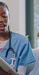 Nurse, tablet and patient advice in nursing home, healthcare schedule or app in lounge. Explain, happy and black woman with caregiver, telehealth or online wellness tips with guidance in retirement
