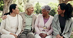 Bonding, laugh and friends in park with hug, funny chat and happy moment in healthy relationship. Smile, embrace and mature women with hangout, joke reaction and connection with outdoor gossip.
