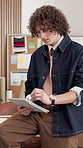 Creative, pen and man in office with tablet, ads objective and audience feedback in web review. Reading, stylus and brand specialist with tech, campaign result and market research for company growth.