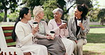 Women, friends and chat on bench with coffee, fitness tips and relax with gossip story for bonding. Mature people, walking group and drink in park for break, discussion and sharing wellness ideas