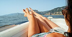 Fun, happy and carefree women on a boat trip sailing in the ocean or sea water on a summer day. Cool and excited tourists or thrill seeker best friends enjoying their vacation or holiday