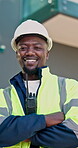 Construction, face and black man with arms crossed, site manager and pride as compliance surveyor. Happy, confidence or supervisor with portrait, safety officer and about us in building development.